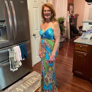 Beautiful gown with diamond studded straps.